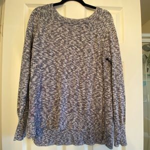 Light sweater. Marbling of blue and white.